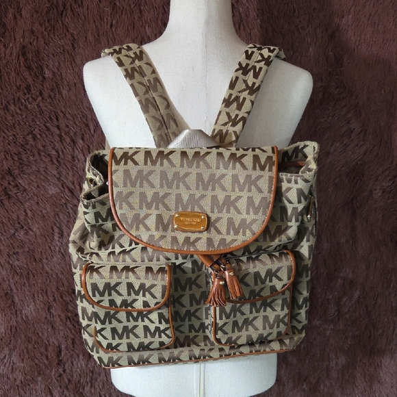 Michael Kors Handbags - Michael Kors Jet Set Signature Flap Tech backpack